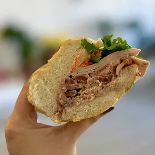 #1 Bánh Mì Dặc Biệt w/ chả (fancy pork), giò thủ (headcheese), pâté, mayo, veggies | $8.50