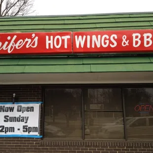 Sign on the front of the building.