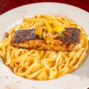 Blackened Salmon over a bed of linguine.