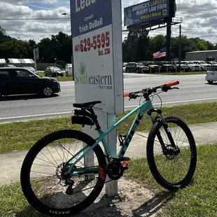No bike parking so I had to lock up on this sign. Outside photo.