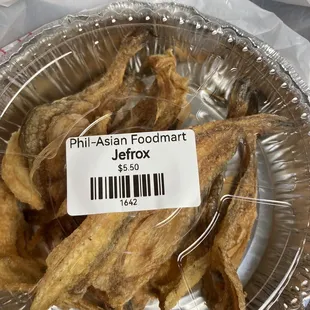 a container of fried fish