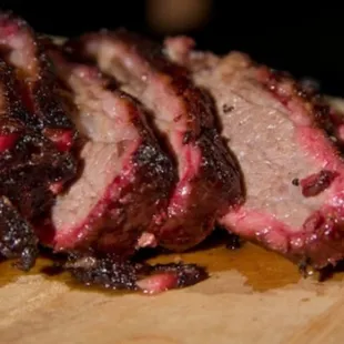 a piece of meat on a cutting board