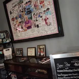 a chalkboard with a drawing of a family