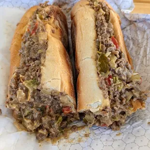 Large cheese steak with onions, cherry peppers, and extra  cheese.