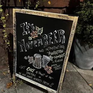 a blackboard sign for a pub