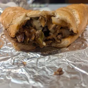 Philly cheesesteak with the works (without hot pepper)