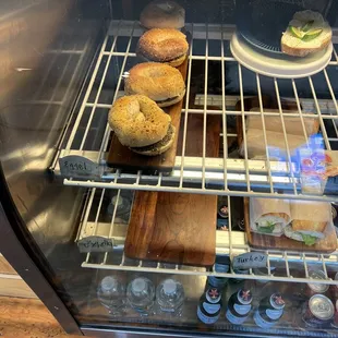 a variety of pastries in a display case