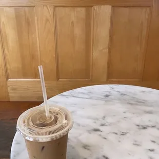 Iced latte with hazelnut and oat milk