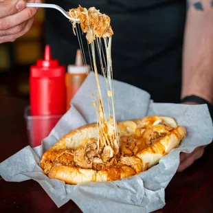 Buffalo Chicken Sandwich includes
Chicken, with grilled Onions, Red Devil Sauce and Provolone. Superb!