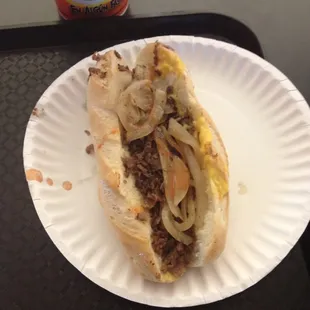 Philly cheesesteak with grilled onions and cheese wiz