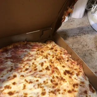 a cheese pizza in a box
