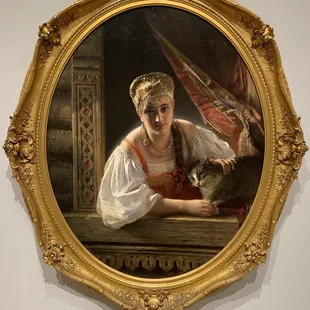 Konstantin Makovsky Russian, 1839-1915 Russian Beauty with Cat