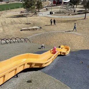 Big yellow slide. Giant, but slow. There&apos;s so many different play places throughout the park.