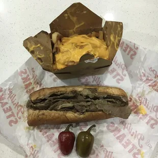 The cheesesteak was small and fries were sloppy, but both taste good though