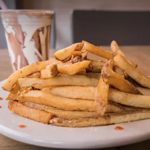 a pile of fries on a plate