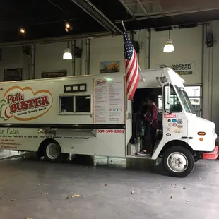 a food truck parked in a garage