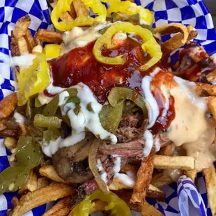 Fair fries with Brisket Philly cheese steak toppings. Great fork food.  #UpCloseSavor XP