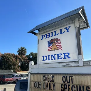 a sign for philly diner