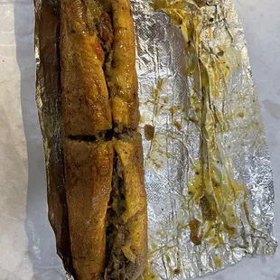 a sandwich wrapped in foil