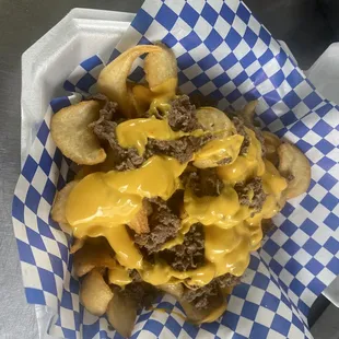 Famous Philly Fries 
FF - steak and wizz