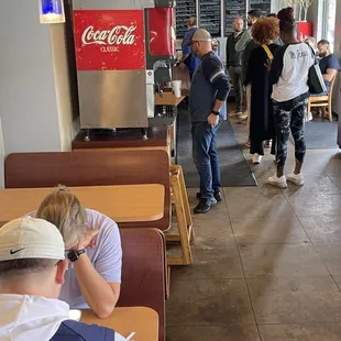 a group of people in a restaurant