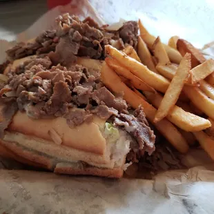 Philly cheesesteak with provolone and fries