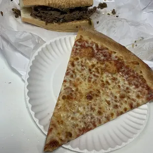 Philly cheesesteak and cheese pizza slice