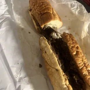 Mushroom cheese steak in horrible lighting but the you can see the cheese pull.