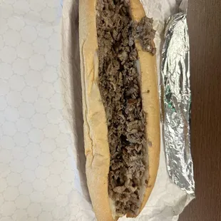 The Philly cheese steak was amazing  we had the wings but they needed a bit more seasoning .