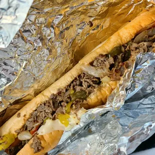 Large philly steak w/ provolone cheese, grilled peppers, onions, &amp; banana peppers Large