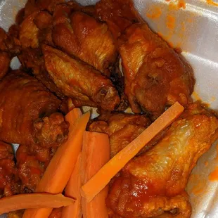 Dozen hot wings.  Good size, properly cooked.  Very traditional hot wing sauce.  Hit the spot for my craving.