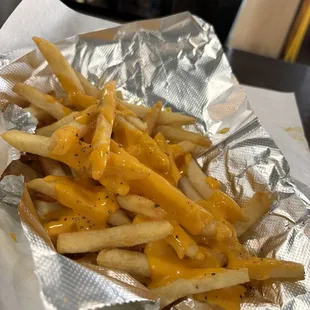 I ordered the combo with the burger and these are the Cheese Fries. I added black pepper.