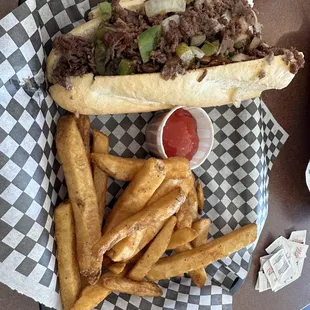 My sandwich with bell peppers, mushrooms fried onions and pepper jack. Great French fries, way better than traditional steak fries.