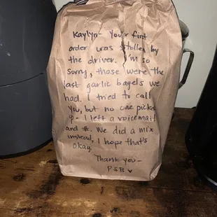 a poem written on a brown paper bag