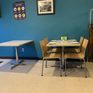 a table and chairs in a restaurant