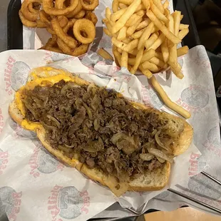 Original Philly Cheese Steak with fries and onion rings