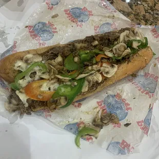 Cheesesteak with peppers and mushrooms