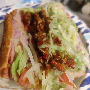 The Italian sub the mortadella subbed for turkey . They pack in the meat always fresh and great portions