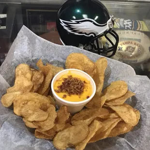 Kettle Chips with Cheddar Cheese Sauce.