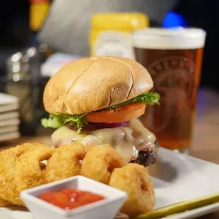 a burger and onion rings