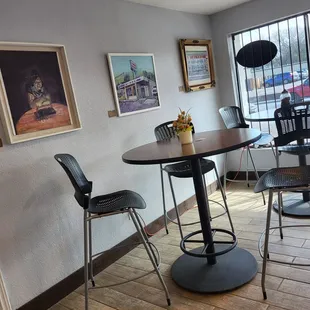 a table and chairs in a restaurant