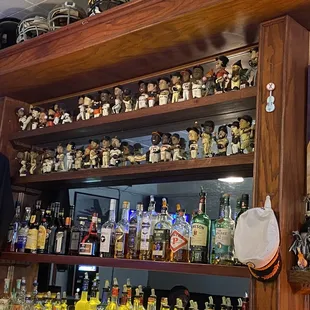 a shelf full of sports memorabilia
