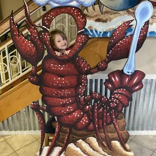 My daughter in the crawfish at entrance