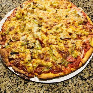 Green pepper, mushrooms, onions, and pepperoni pie. The cornerstone of any nutritious meal!