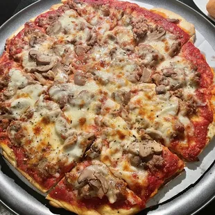 Large mushroom &amp; sausage pizza