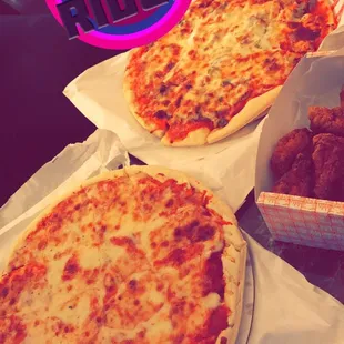 We ordered two pizzas, the first with peppers and Italian beef and the second was a cheese pizza! We also got some hot wings!