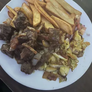 Mbuzi Khadhalika, French Fries and cabbage