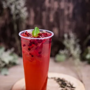 Pom Poms - Pomegranate Strawberry Black Tea topped with fresh Pomegrante seeds