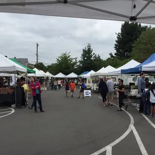 people walking through the market