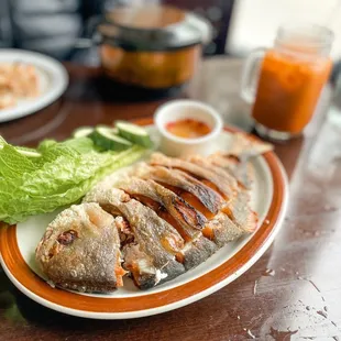 Whole fried pompano with chili fish sauce